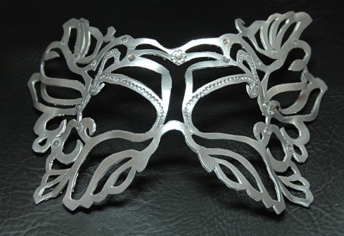 This mask was made from craft foam and rub-n-buffed to be silver.