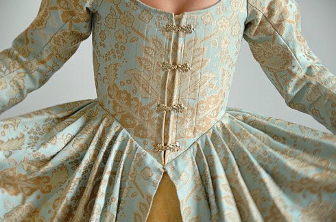 The bodice was altered to close in the front.