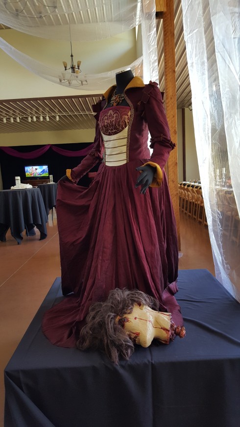 Judith's costume with a severed head on display.